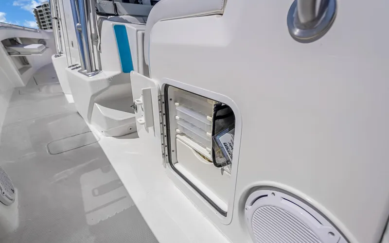  Yacht Photos Pics 2016 Invincible 39 boat interior with storage compartment and speaker.