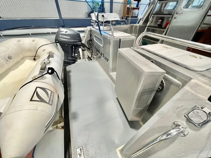  Yacht Photos Pics 2007 Coastal Craft 36 Cruiser with Zodiac inflatable and Yamaha motor on deck.