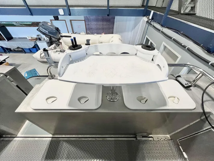  Yacht Photos Pics 2007 Coastal Craft 36 Cruiser boat deck with equipment and storage compartments.