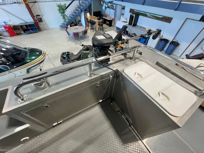  Yacht Photos Pics 2007 Coastal Craft 36 Cruiser interior with stainless steel fixtures and storage compartments.