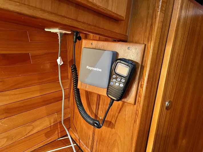  Yacht Photos Pics Wooden interior of 2007 Coastal Craft 36 Cruiser with Raymarine radio equipment.