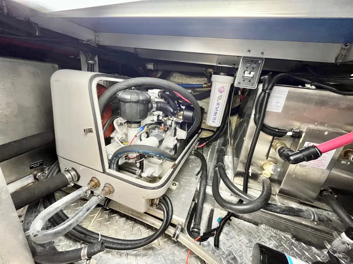  Yacht Photos Pics Engine room of 2007 Coastal Craft 36 Cruiser with visible machinery and wiring.