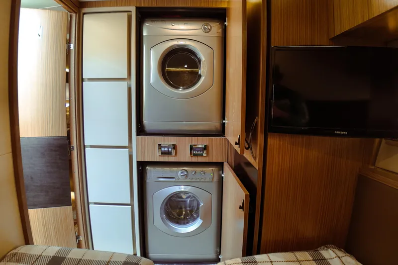 Incognito Yacht Photos Pics Laundry area inside 2016 Sea Ray L590 Fly yacht with washer and dryer.