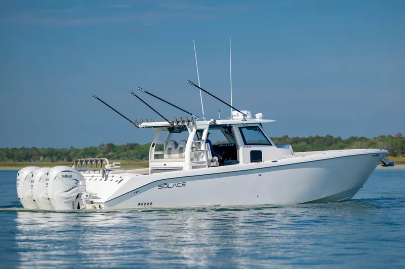 Yacht Photos Pics 2022 Solace 41 CS boat with Yamaha engines on calm water.