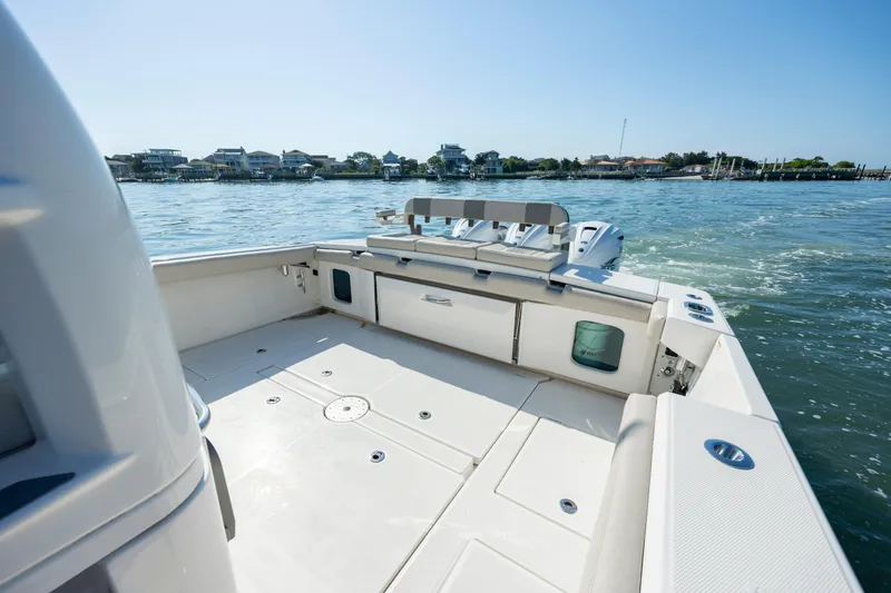  Yacht Photos Pics 2022 Solace 41 CS boat deck with scenic waterfront view.