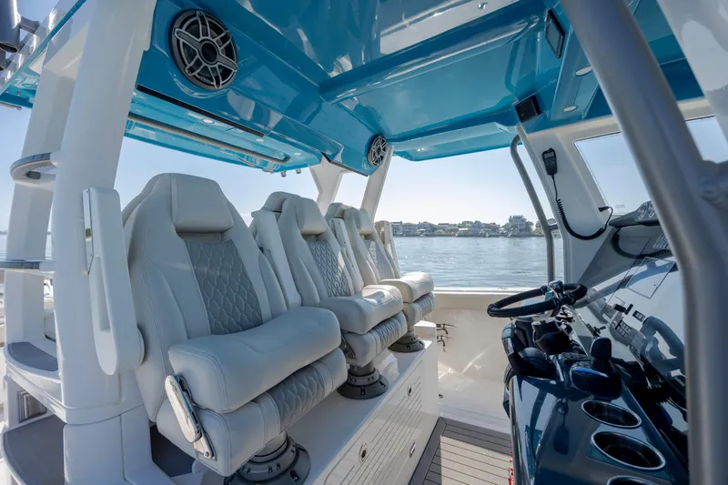  Yacht Photos Pics 2022 Solace 41 CS boat interior with luxury seating and modern controls.