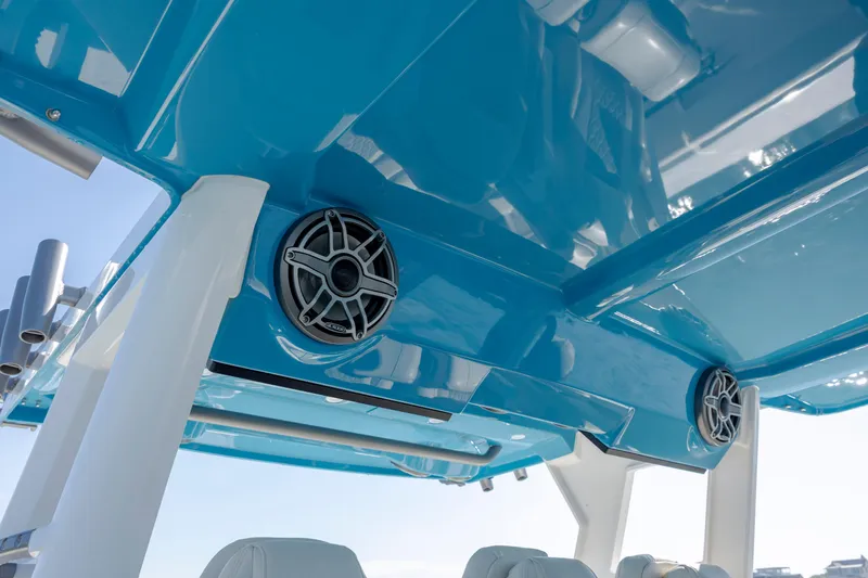  Yacht Photos Pics Blue canopy with speakers on a 2022 Solace 41 CS boat.