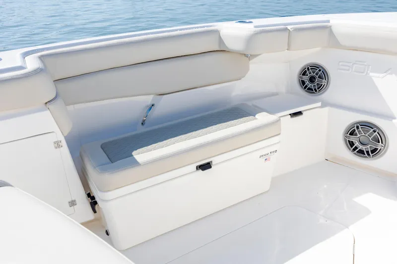  Yacht Photos Pics 2022 Solace 41 CS boat interior with cushioned seating and built-in speakers.