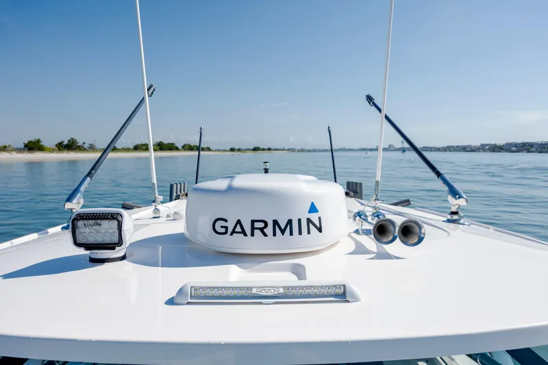  Yacht Photos Pics Bow of 2022 Solace 41 CS boat with Garmin radar on calm water.