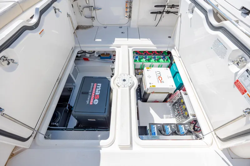  Yacht Photos Pics Engine compartment of 2022 Solace 41 CS boat with generator and battery systems.