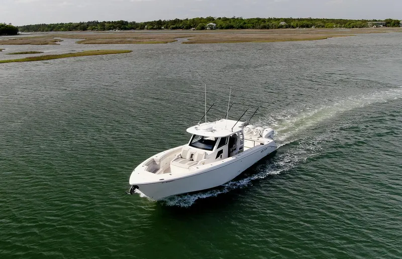  Yacht Photos Pics 2022 Solace 41 CS boat cruising on a calm waterway.