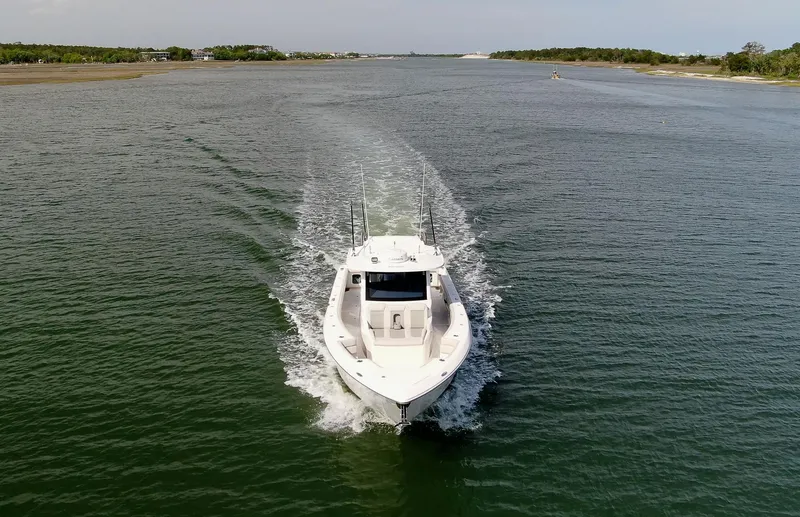 Yacht Photos Pics 2022 Solace 41 CS boat cruising on a calm waterway.