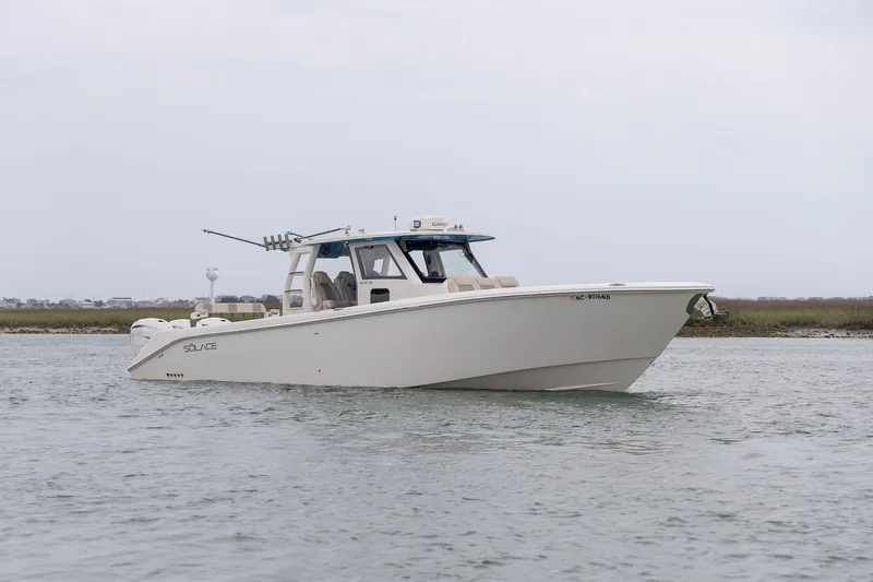  Yacht Photos Pics 2022 Solace 41 CS boat cruising on calm waters, showcasing sleek design and modern features.