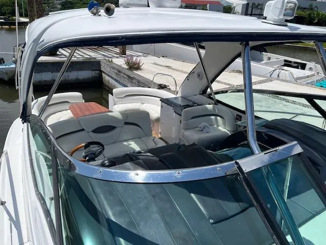 Alacrity Yacht Photos Pics 2008 Doral Mediterra yacht with spacious cockpit and seating, docked at marina.