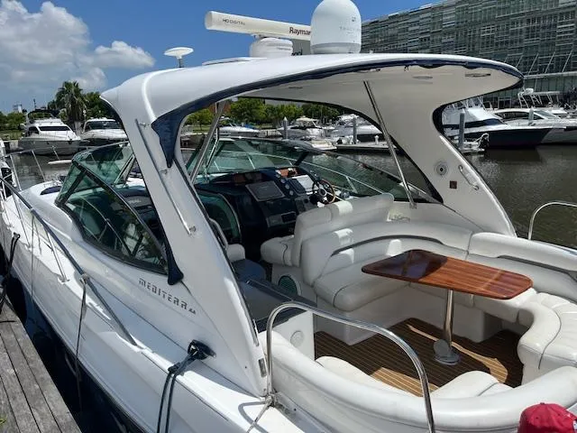 Alacrity Yacht Photos Pics 2008 Doral Mediterra yacht with sleek design, docked at marina under clear blue sky.