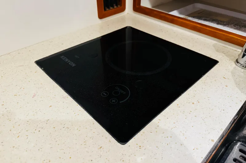 By The Way Yacht Photos Pics Kenyon cooktop on MJM 36z Express 2015 yacht's countertop.