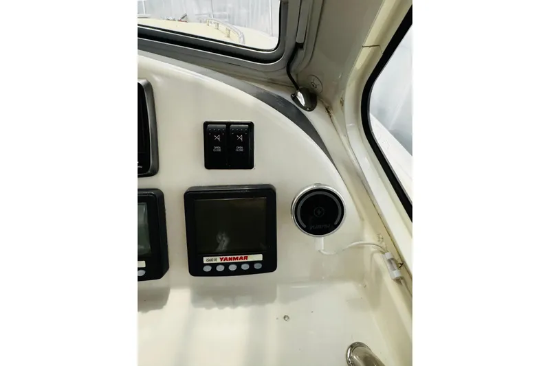 By The Way Yacht Photos Pics 2015 MJM 36z Express dashboard with Yanmar display and controls.