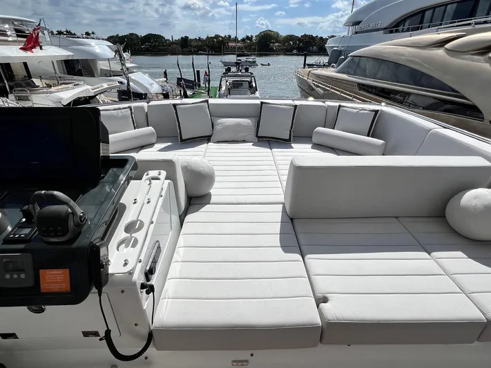 Yacht Photos Pics 2024 Sirena 48 Flybridge yacht with spacious sun deck and luxurious seating.