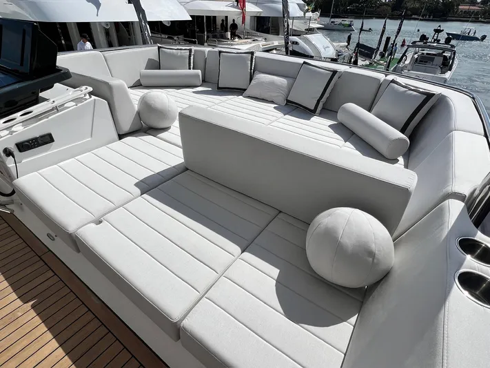  Yacht Photos Pics Luxurious seating area on 2024 Sirena 48 Flybridge yacht, featuring elegant cushions and modern design.