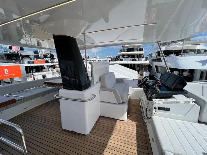  Yacht Photos Pics 2024 Sirena 48 Flybridge yacht interior with modern helm and seating area.