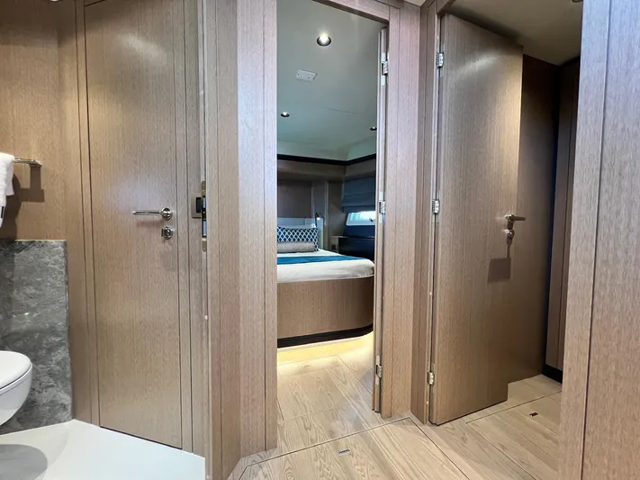  Yacht Photos Pics Luxurious interior of 2024 Sirena 48 Flybridge yacht, featuring modern wood finishes and elegant design.