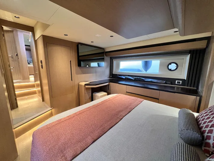  Yacht Photos Pics Luxurious interior of 2024 Sirena 48 Flybridge yacht bedroom with modern design.
