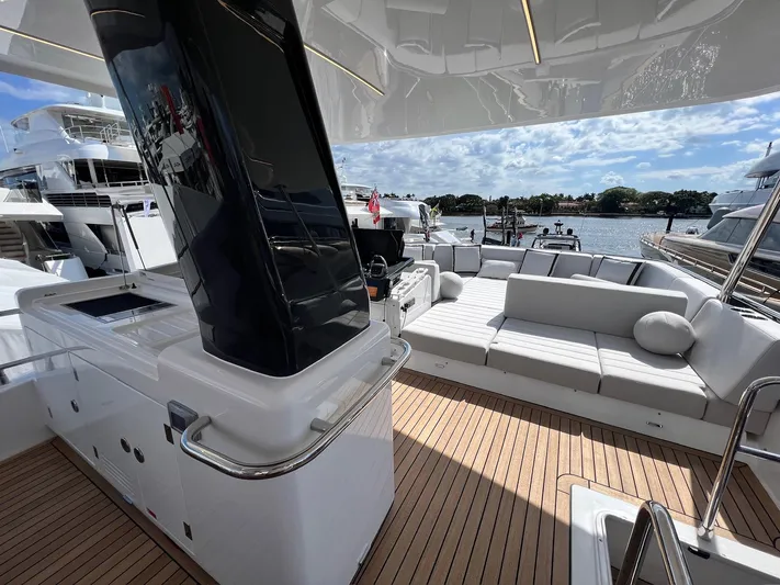  Yacht Photos Pics 2024 Sirena 48 Flybridge yacht with spacious deck and luxurious seating.