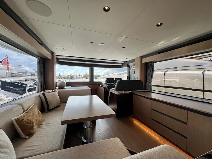  Yacht Photos Pics Luxurious interior of 2024 Sirena 48 Flybridge yacht with modern furnishings and panoramic windows.