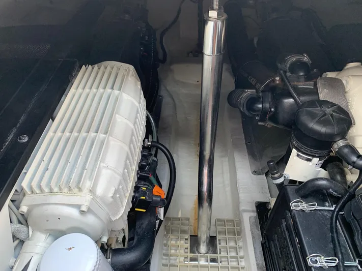  Yacht Photos Pics Engine compartment of a 2017 Fjord 42 Open boat, showcasing mechanical components.
