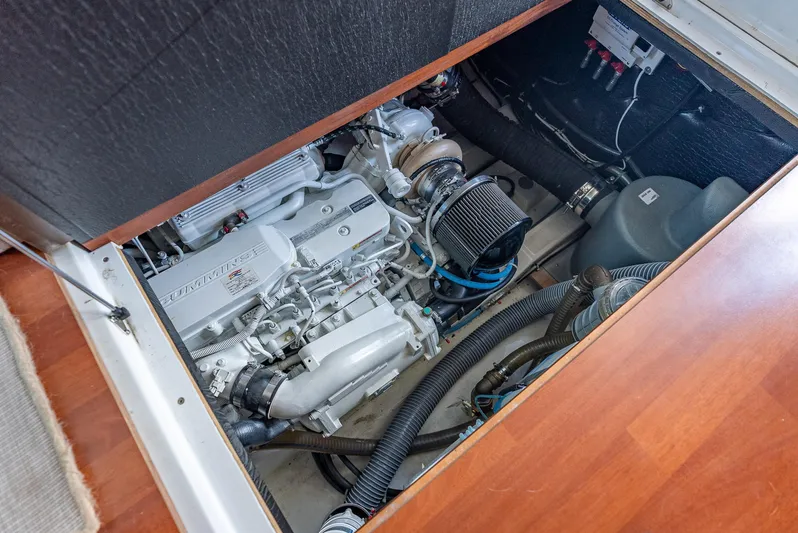 Good Timimg Yacht Photos Pics Engine compartment of 2015 Beneteau Swift Trawler 34, featuring a Cummins engine.