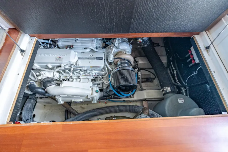 Good Timimg Yacht Photos Pics Engine compartment of 2015 Beneteau Swift Trawler 34, featuring a Cummins engine.