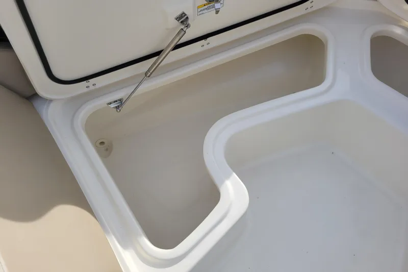  Yacht Photos Pics Open storage compartment on 2023 Boston Whaler 280 Vantage boat.