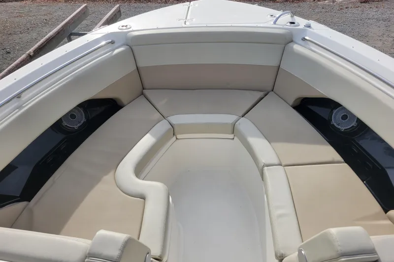  Yacht Photos Pics 2023 Boston Whaler 280 Vantage boat interior with beige seating and speakers.