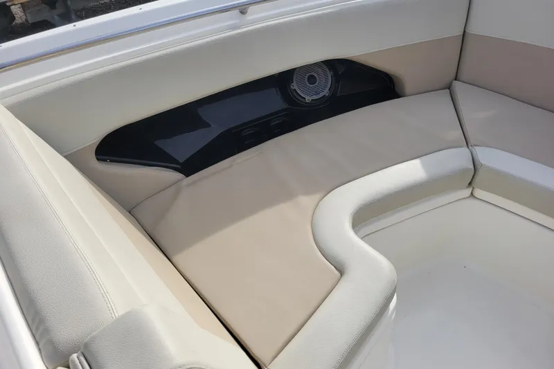  Yacht Photos Pics 2023 Boston Whaler 280 Vantage boat interior with cushioned seating and speaker.