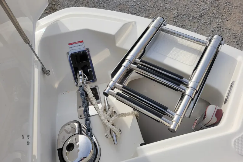  Yacht Photos Pics 2023 Boston Whaler 280 Vantage boat ladder and anchor compartment detail.