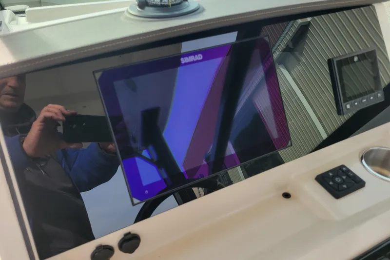  Yacht Photos Pics 2023 Boston Whaler 280 Vantage dashboard with Simrad display and controls.