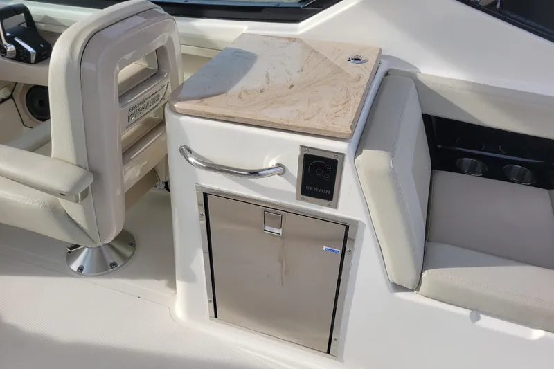  Yacht Photos Pics Interior of 2023 Boston Whaler 280 Vantage boat with seating and Kenyon grill.