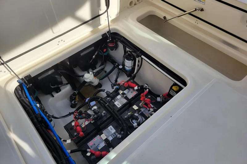  Yacht Photos Pics 2023 Boston Whaler 280 Vantage engine compartment with batteries and wiring.
