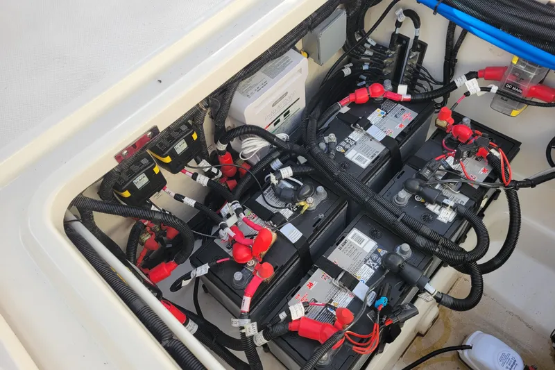  Yacht Photos Pics Battery compartment of 2023 Boston Whaler 280 Vantage, showcasing wiring and connections.
