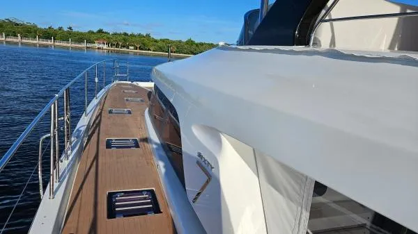 Sunlove Yacht Photos Pics 2024 Lagoon SIXTY 7 yacht deck with sleek design and wooden flooring.
