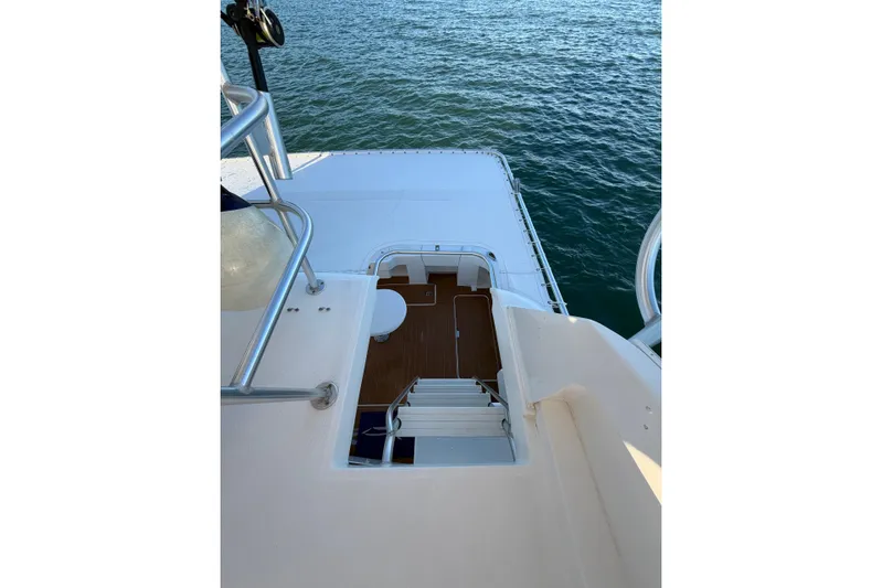  Yacht Photos Pics 2005 Luhrs 38 Convertible yacht deck overlooking ocean.