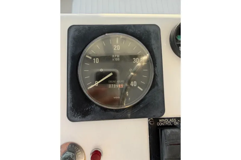  Yacht Photos Pics Tachometer of 2005 Luhrs 38 Convertible boat showing RPM and engine hours.