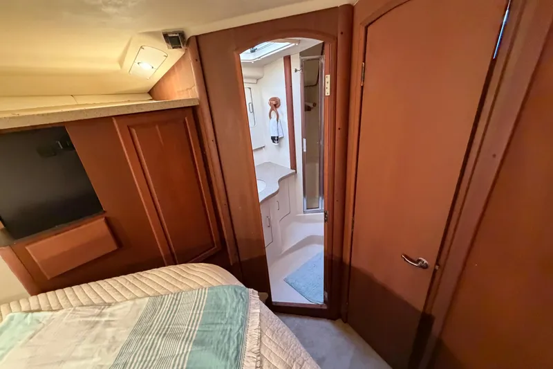  Yacht Photos Pics 2005 Luhrs 38 Convertible cabin interior with bathroom view.