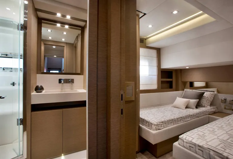  Yacht Photos Pics Luxurious interior of 2016 Prestige 750 yacht with modern bedroom and bathroom design.