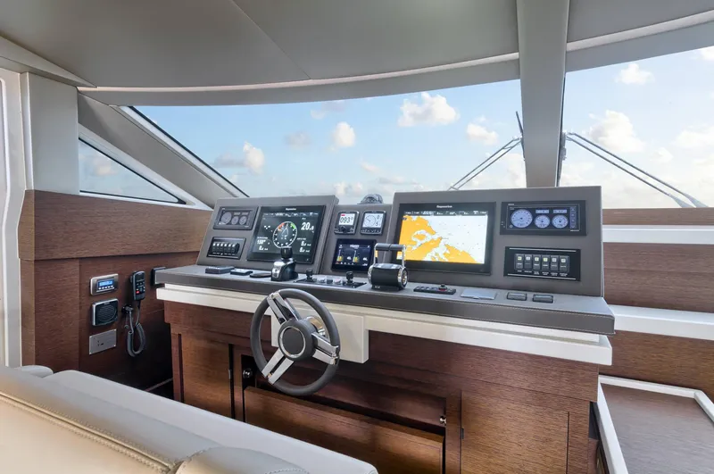  Yacht Photos Pics Prestige 750 yacht helm, 2016 model, featuring advanced navigation systems and luxurious interior design.