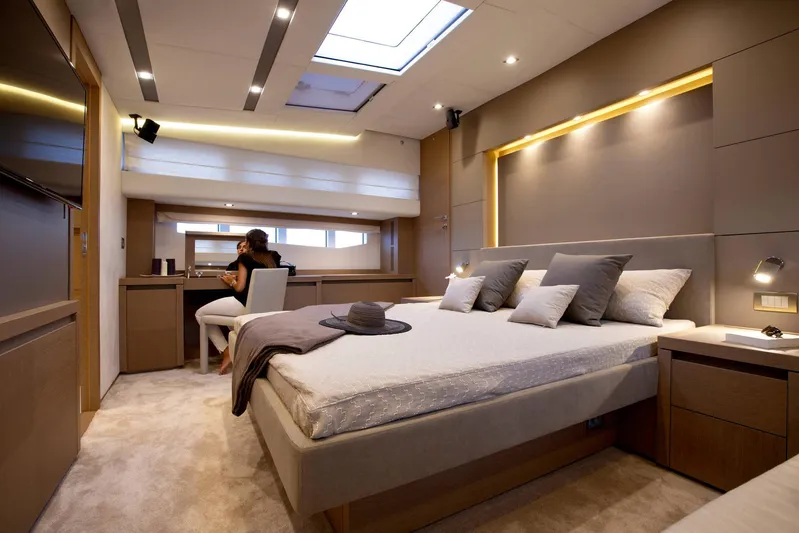  Yacht Photos Pics Luxurious bedroom interior on 2016 Prestige 750 yacht with modern design and skylight.