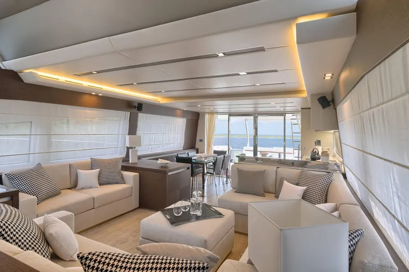  Yacht Photos Pics Luxurious interior of 2016 Prestige 750 yacht with modern furnishings and ocean view.