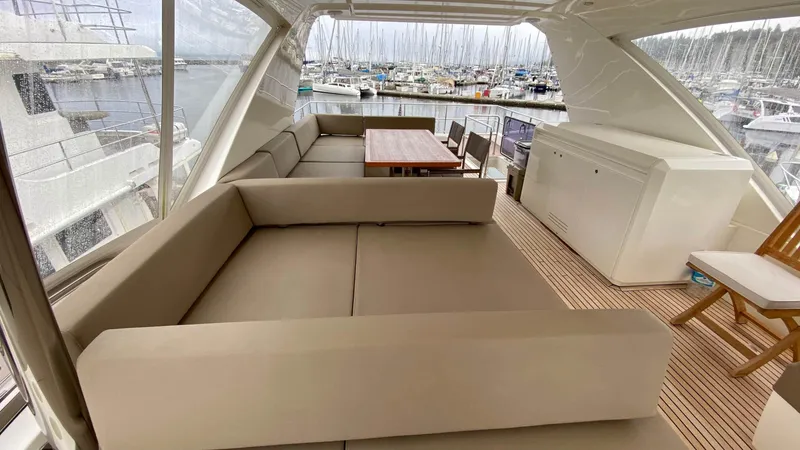  Yacht Photos Pics Luxurious 2016 Prestige 750 yacht interior with spacious seating and dining area.