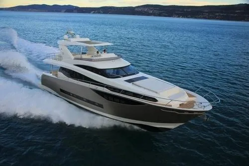  Yacht Photos Pics Luxury 2016 Prestige 750 yacht cruising on open water.