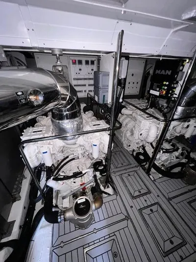  Yacht Photos Pics Engine room of 2016 Prestige 750 yacht with MAN engines and control panels.